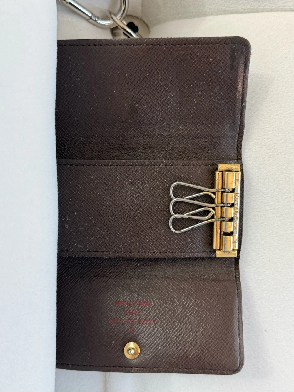 SOLD Louis Vuitton Brown Damier Ebene Canvas Key Pouch with Gold Button